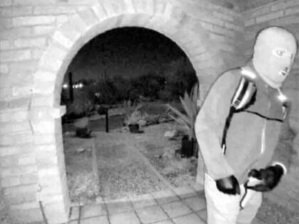 FBI Releases Photos of Armed, Masked Man Outside Nancy Guthrie’s Home