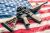 AR-15-Rifle-American-Flag-iStock-kenlh-534156339-600x401-1