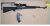 Routh-Rifle-SKS-shows-magazine-and-ammo-and-makeshift-scope-mount-789-600x321-1